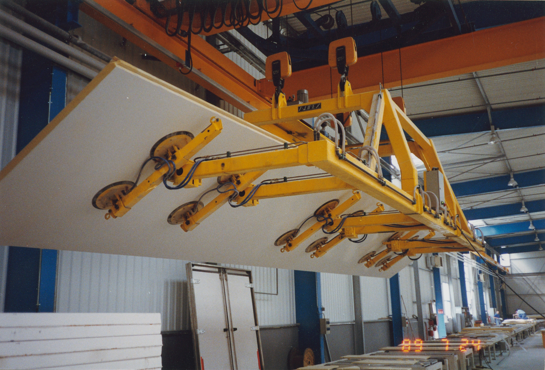 Vacuum lifter to grip, lift turn, tilt